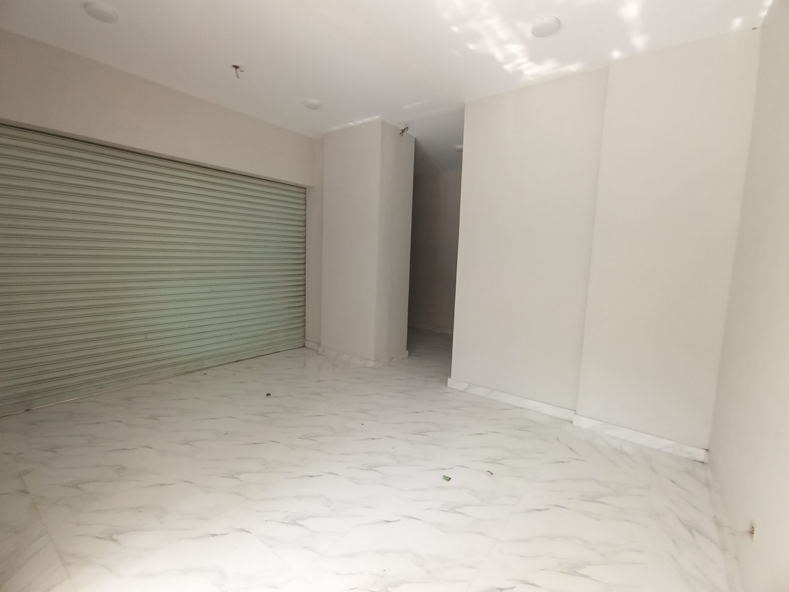 230 Sq Ft Corner Showroom for Sale – Clifton Block 4 (Next to Imtiaz, Opposite Dolmen Mall)